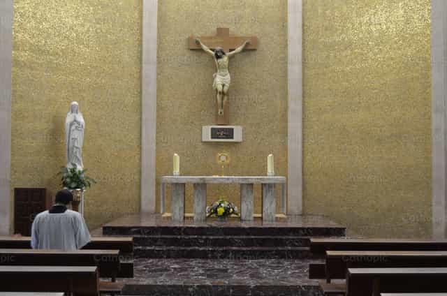 Religious worshiping Jesus - Catholic stock images