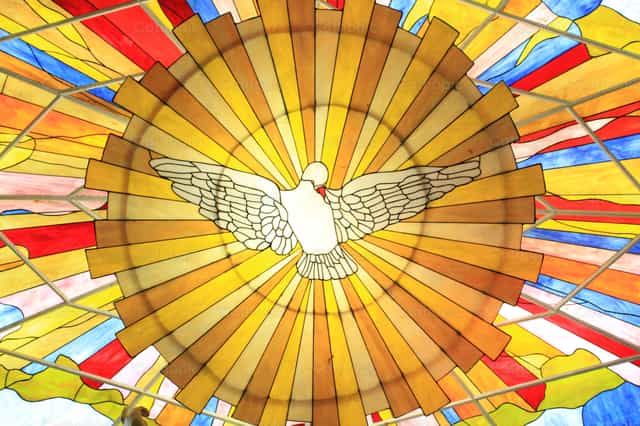 Holy Spirit stained glass - Catholic stock images