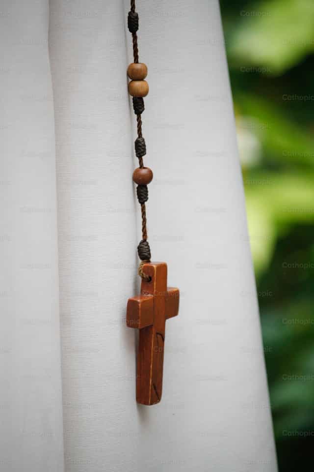 Rosary as part of the habit of the nun - Catholic stock images - Photo by Yandry Fernández Perdomo