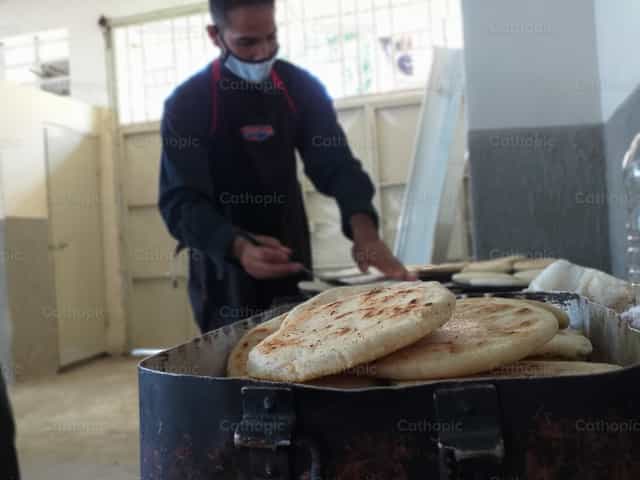 Solidarity arepas - Catholic stock images - Photo by GrexyC