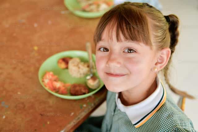 Fille souriante - Images catholiques de stock