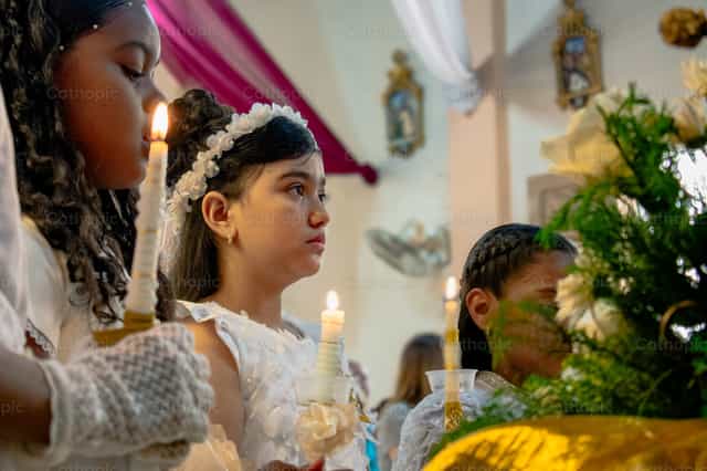 Light at First Communion - Catholic stock images - Photo by Miguel White