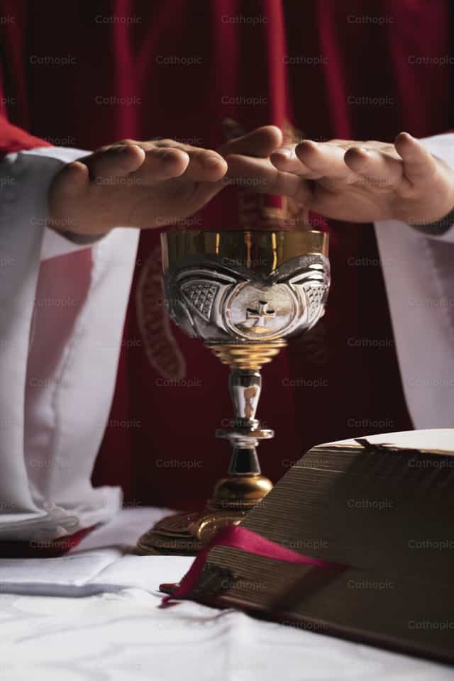 Consecration of the Chalice - Catholic stock images