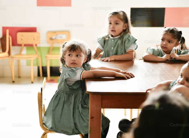 Children in the classroom - Catholic stock images - Photo by Carolina BR