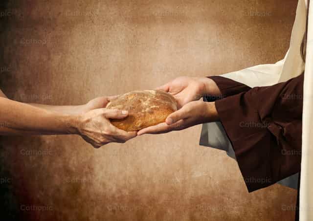 Jesús da el pan a un mendigo - Banco de imágenes católicas