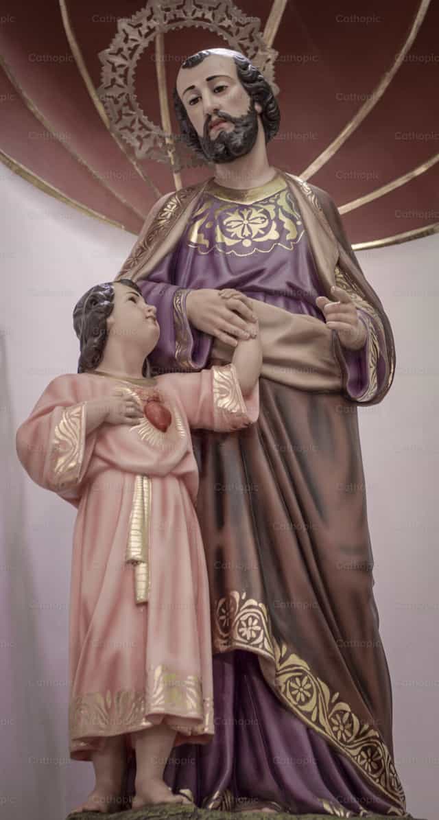 Enfant Jésus avec saint Joseph - Images catholiques de stock
