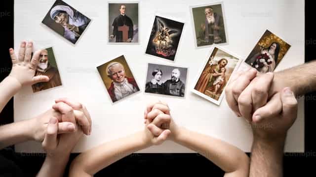 All saints in family prayer - Catholic stock images - Photo by Jakov Pleše