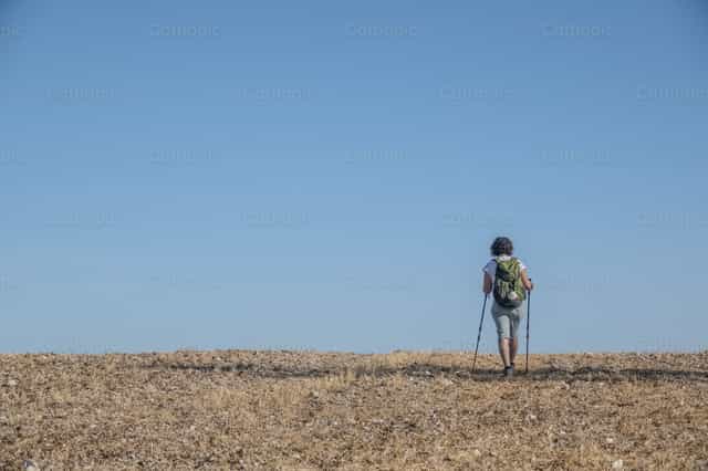 Pilgrim on the Way of Santiago de Compostela. - Catholic stock images - Photo by Joan Sutter