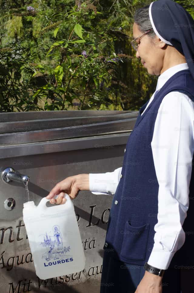 Water from Lourdes - Catholic stock images