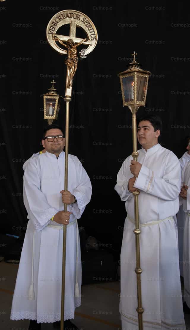 Altar boys with a crucifix and candles - Catholic stock images - Photo by Carolina BR