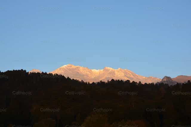Finding God in the mountains - Catholic stock images