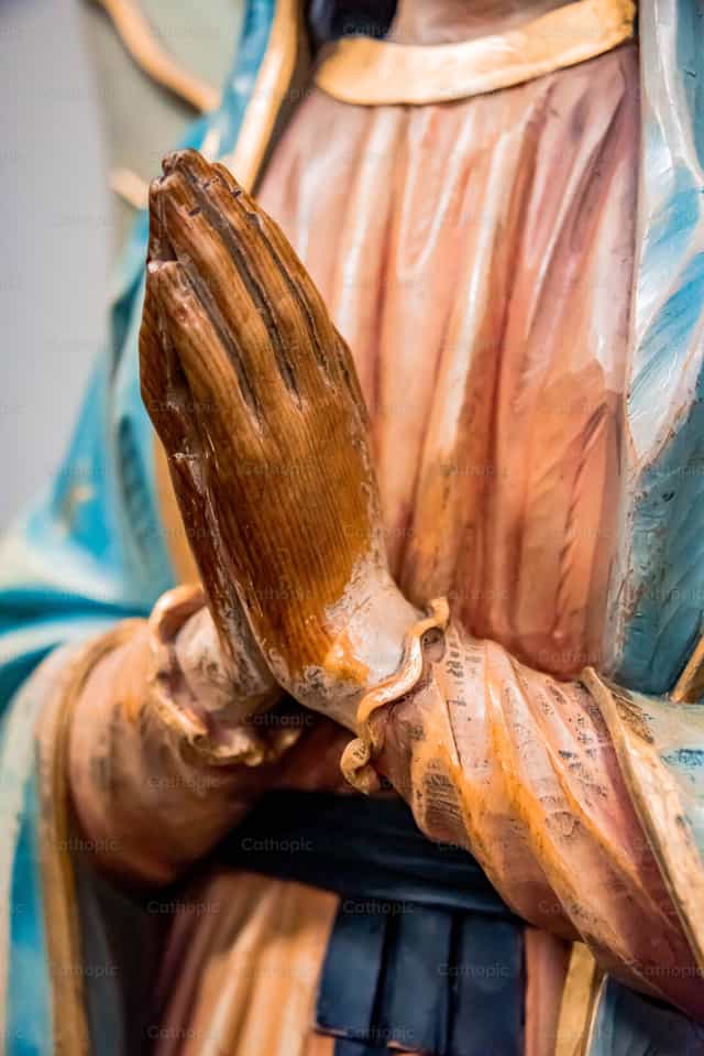 Entre vos mains - Images catholiques de stock