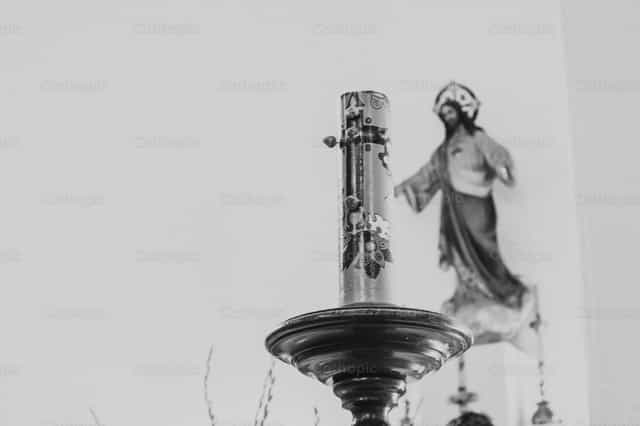 Die Kerze und Christus - Katholische Stockfotos