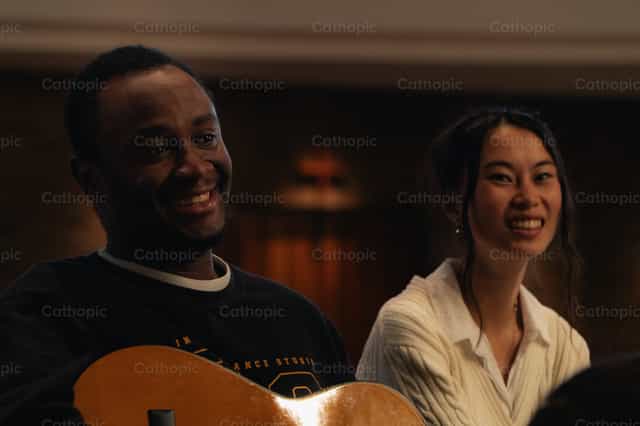 Youth living together in a multicultural encounter - Catholic stock images