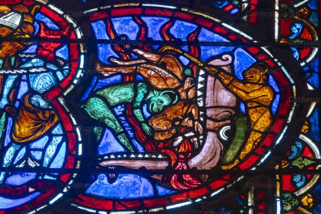 Vetrata raffigurante demoni e anime dannate - Immagini stock cattoliche - Foto di Joan Sutter