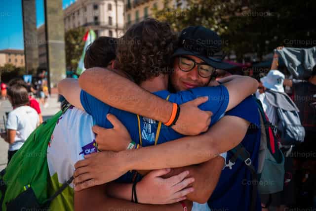 Group hug - Catholic stock images