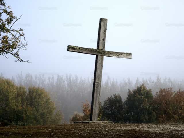Cross in the landscape - Catholic stock images