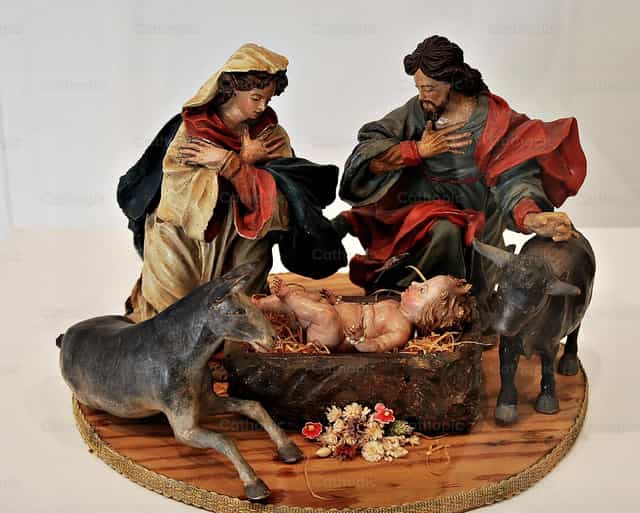 Filho, Mãe e Pai - Imagens católicas de stock