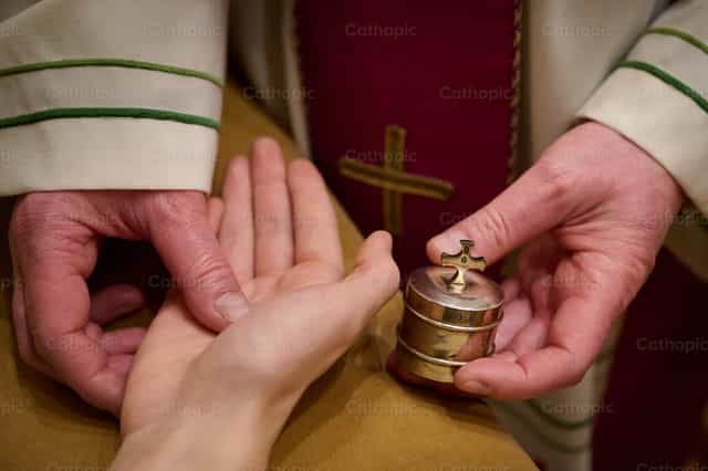Sacrament of the Anointing of the Sick - Catholic stock images - Photo by Wilbert Maximus