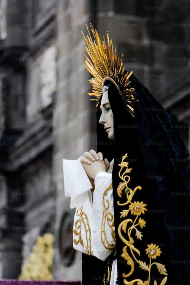 The Dolorosa standing by the cross - Catholic stock images - Photo by Erika Rdz Tenorio