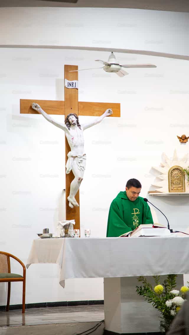 Image of Jesus Christ and priest during the Mass - Catholic stock images