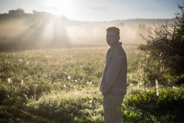 Young Egyptian catholic at dawn - Catholic stock images - Photo by Vytautas Markūnas SDB