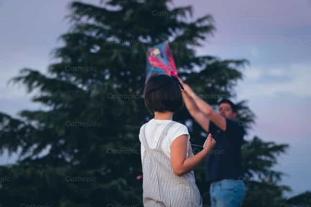 Playing with kites - Catholic stock images - Photo by Almures Studio
