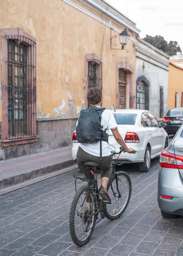 Pessoas a pedalar - Imagens católicas de stock