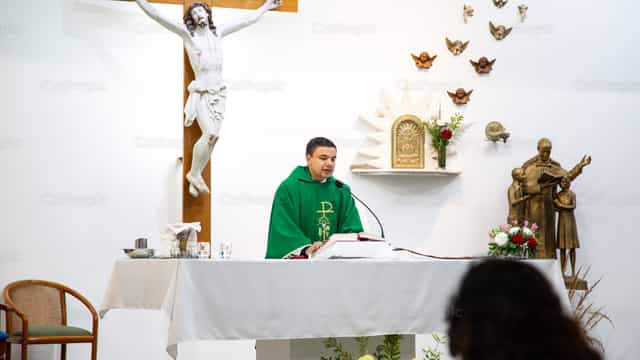 Priest celebrating the Eucharist - Catholic stock images