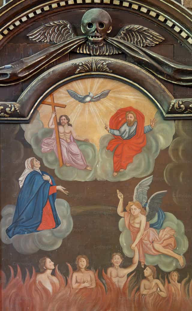 Religiöses Gemälde, das Seelen im Fegefeuer darstellt - Katholische Stockfotos