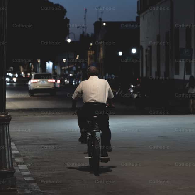 Old man on a Motorcycle - Catholic stock images - Photo by Cathopic