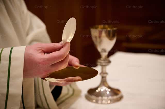 Sacrament of Holy Communion - Catholic stock images - Photo by Wilbert Maximus