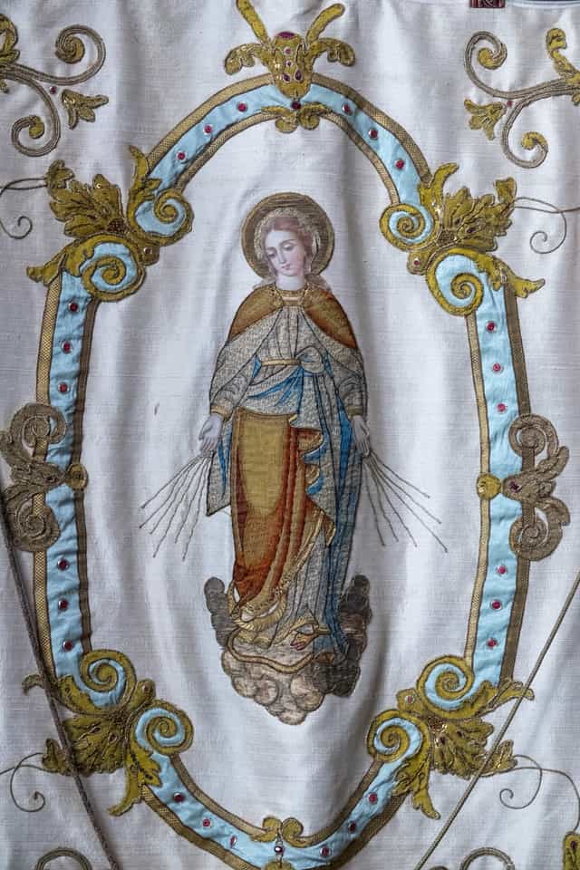 Embroidered Banner Depicting the Virgin Mary - Catholic stock images