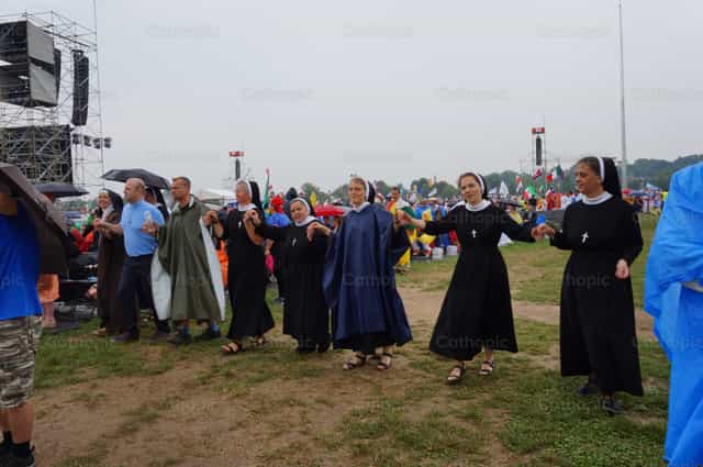 Sisters dancing WYD Krakow 2016 - Catholic stock images
