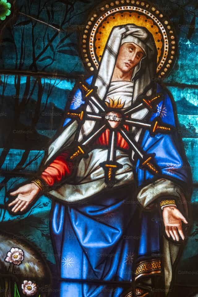 Mary with seven swords piercing her sacred heart - Catholic stock images - Photo by Joan Sutter