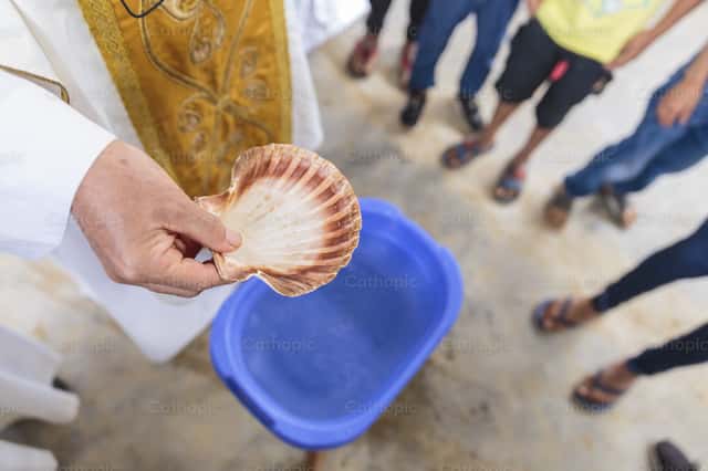 Bishop with baptismal shell in Peru - Catholic Stock Images